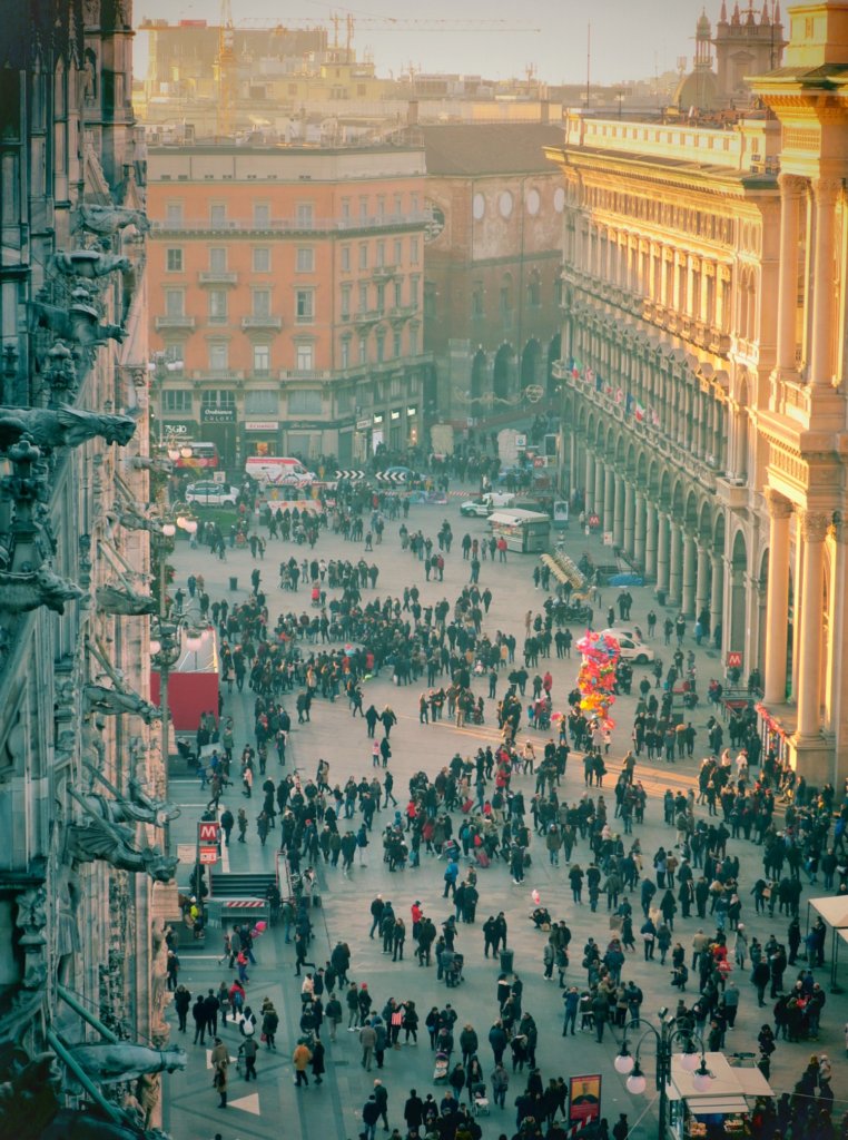 Looking down at hoards of tourists in the Piazza del Duomo, from the Duomo di Milano rooftop