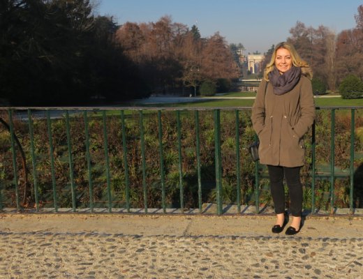 Nina (squinting into the bright sunshine) at the Parco Sempione on New Year's Day 2017 in Milan