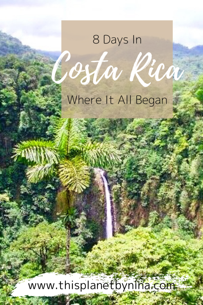 Dense rainforest falls into an opening with La Fortuna waterfall plummeting down inside. The title ' 8 Days In Costa Rica - Where It All Began' is at the top.