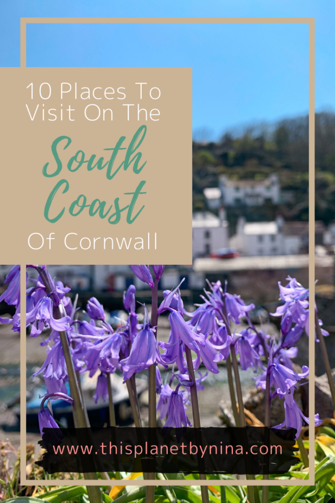 A Pinterest Pin with lilac flowers in the foreground and a sunny Polperro in the background, with the title '10 Places To Visit On The South Coast Of Cornwall'.