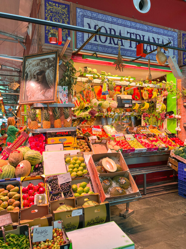 Fruit and vegetable stall inside the Triana Market - 10 things to do in Seville