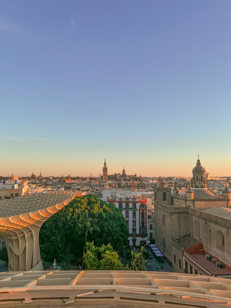 View from the top of Las Setas de Sevilla across the city to the cathedral - 10 things to do in Seville.